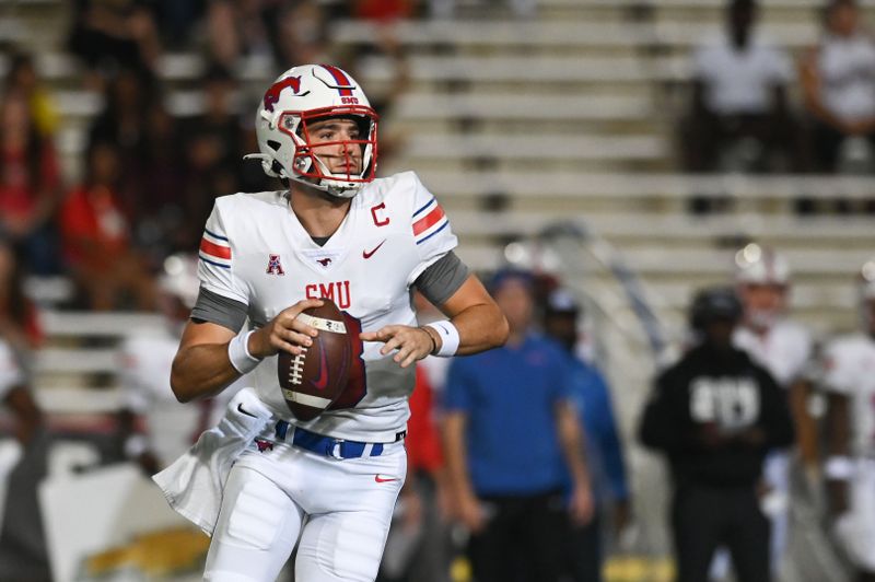 Sep 17, 2022; College Park, Maryland, USA; Southern Methodist Mustangs quarterback Tanner Mordecai (8) rolls out to pass during the first quarter against the Maryland Terrapins  at Capital One Field at Maryland Stadium. Mandatory Credit: Tommy Gilligan-USA TODAY Sports