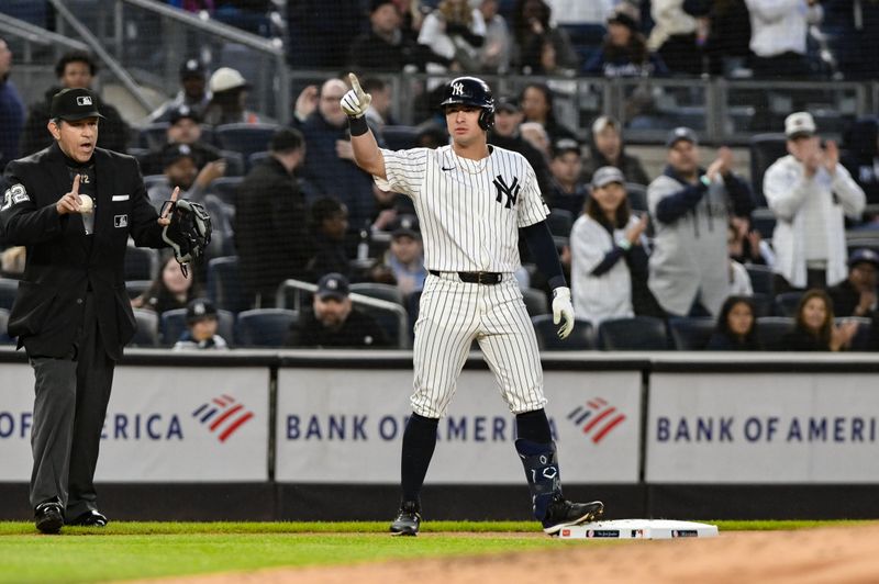 May 21, 2025; Bronx, New York, USA; New York Yankees shortstop Anthony Volpe (11) reacts after hitting a triple against the Texas Rangers during the second inning at Yankee Stadium. Mandatory Credit: John Jones-Imagn Images