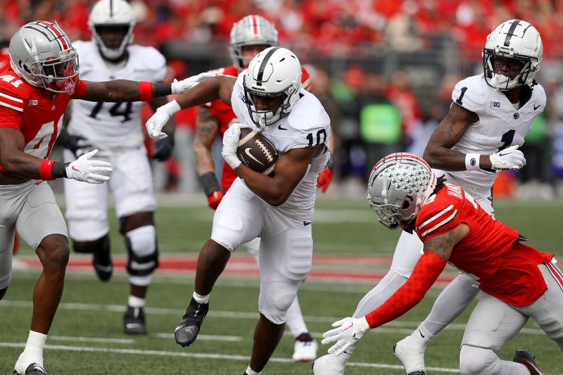 Oct 21, 2023; Columbus, Ohio, USA;  Penn State Nittany Lions running back Nicholas Singleton (10) runs the ball against the Ohio State Buckeyes during the second quarter at Ohio Stadium. Mandatory Credit: Joseph Maiorana-USA TODAY Sports