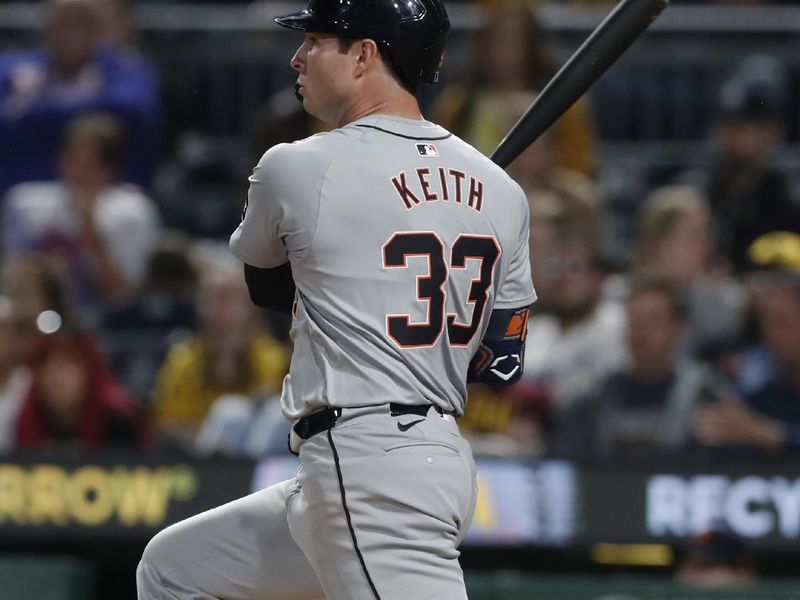 Apr 8, 2024; Pittsburgh, Pennsylvania, USA;  Detroit Tigers second baseman Colt Keith (33) hits a single against the Pittsburgh Pirates during the eighth inning at PNC Park. Mandatory Credit: Charles LeClaire-USA TODAY Sports