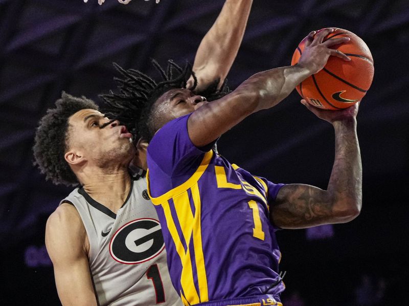 Feb 14, 2023; Athens, Georgia, USA; LSU Tigers guard Cam Hayes (1) tries to score guarded by Georgia Bulldogs guard Jabri Abdur-Rahim (1) during the first half at Stegeman Coliseum. Mandatory Credit: Dale Zanine-USA TODAY Sports