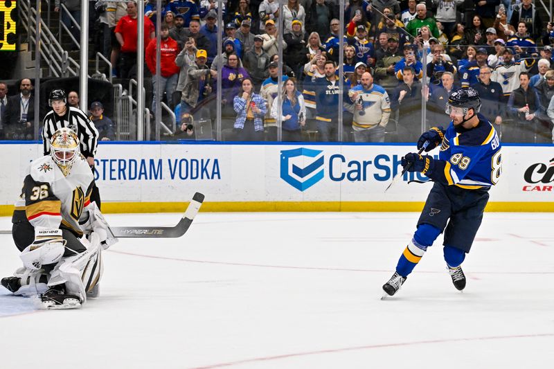 Mar 25, 2024; St. Louis, Missouri, USA;  Vegas Golden Knights goaltender Logan Thompson (36) makes a save on a penalty shot by St. Louis Blues left wing Pavel Buchnevich (89) in overtime at Enterprise Center. Mandatory Credit: Jeff Curry-USA TODAY Sports