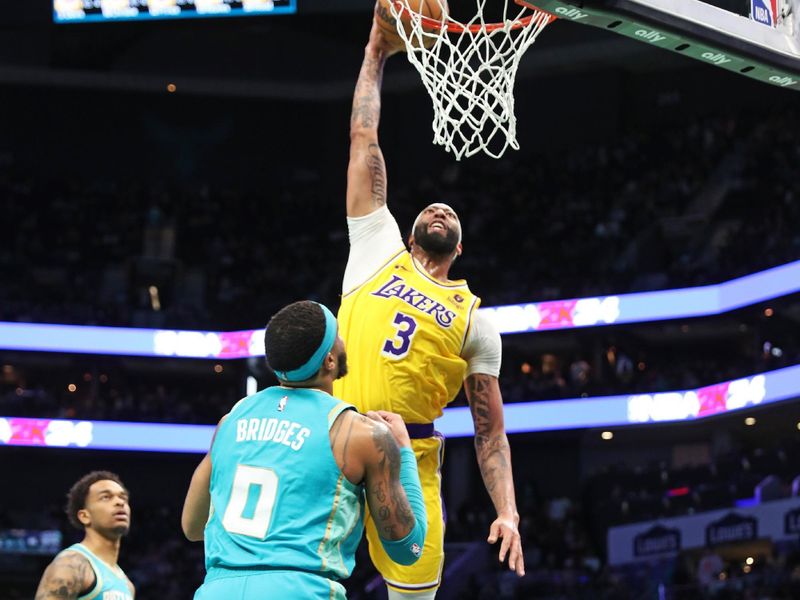 CHARLOTTE, NC - FEBRUARY 5: Anthony Davis #3 of the Los Angeles Lakers drives to the basket during the game  against the Charlotte Hornets on February 5, 2024 at Spectrum Center in Charlotte, North Carolina. NOTE TO USER: User expressly acknowledges and agrees that, by downloading and or using this photograph, User is consenting to the terms and conditions of the Getty Images License Agreement.  Mandatory Copyright Notice:  Copyright 2024 NBAE (Photo by Brock Williams-Smith/NBAE via Getty Images)