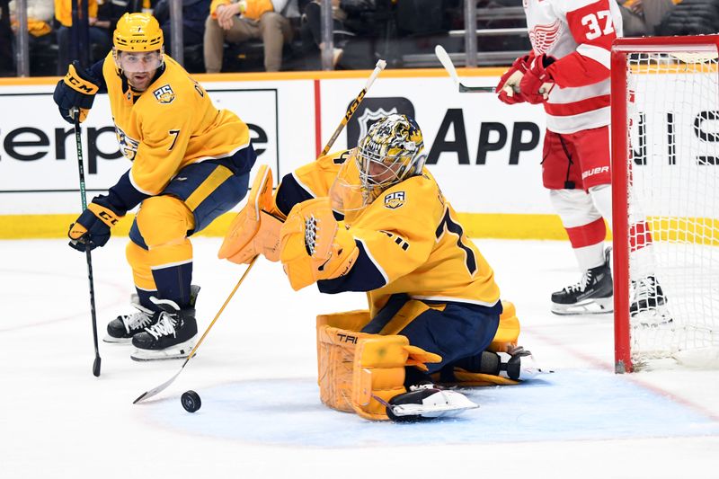 Mar 23, 2024; Nashville, Tennessee, USA; Nashville Predators goaltender Juuse Saros (74) makes a save during the second period against the Detroit Red Wings at Bridgestone Arena. Mandatory Credit: Christopher Hanewinckel-USA TODAY Sports