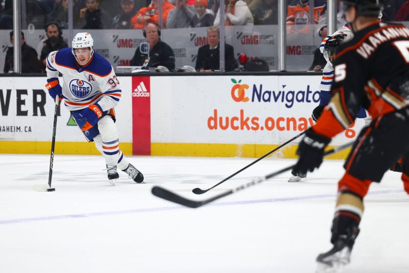 Feb 9, 2024; Anaheim, California, USA; Edmonton Oilers center Ryan Nugent-Hopkins (93) skates with the puck against the Anaheim Ducks during the first period of a game at Honda Center. Mandatory Credit: Jessica Alcheh-USA TODAY Sports