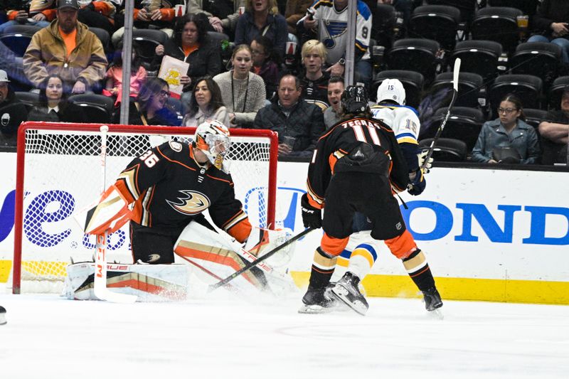 Mar 25, 2023; Anaheim, California, USA; St. Louis Blues left wing Jakub Vrana (15) scores a goal on Anaheim Ducks goalie John Gibson (36) during first period at Honda Center. Mandatory Credit: Kelvin Kuo-USA TODAY Sports