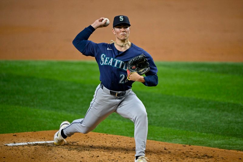 Sep 22, 2024; Arlington, Texas, USA; Seattle Mariners starting pitcher Bryan Woo (22) pitches against the Texas Rangers during the second inning at Globe Life Field. Mandatory Credit: Jerome Miron-Imagn Images