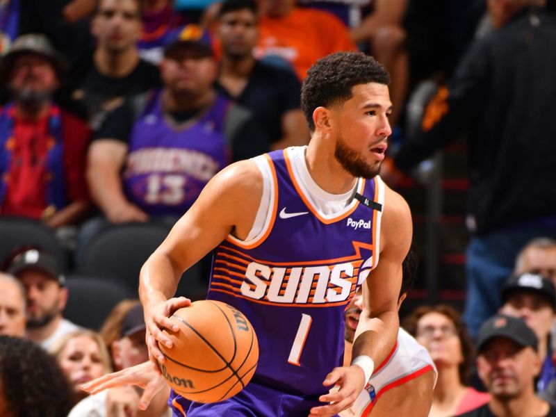PHOENIX, AZ - NOVEMBER 2: Devin Booker #1 of the Phoenix Suns dribbles the ball during the game against the Portland Trail Blazers on November 2, 2024 at Footprint Center in Phoenix, Arizona. NOTE TO USER: User expressly acknowledges and agrees that, by downloading and or using this photograph, user is consenting to the terms and conditions of the Getty Images License Agreement. Mandatory Copyright Notice: Copyright 2024 NBAE (Photo by Barry Gossage/NBAE via Getty Images)