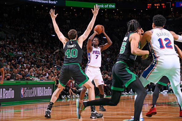 BOSTON, MA - DECEMBER 1: Mo Bamba #7 of the Philadelphia 76ers looks to pass the ball during the game against the Boston Celtics on December 1, 2023 at the TD Garden in Boston, Massachusetts. NOTE TO USER: User expressly acknowledges and agrees that, by downloading and or using this photograph, User is consenting to the terms and conditions of the Getty Images License Agreement. Mandatory Copyright Notice: Copyright 2023 NBAE  (Photo by Brian Babineau/NBAE via Getty Images)