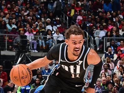 ATLANTA, GA - DECEMBER 23: Trae Young #11 of the Atlanta Hawks handles the ball during the game against the Memphis Grizzlies on December 23, 2023 at State Farm Arena in Atlanta, Georgia.  NOTE TO USER: User expressly acknowledges and agrees that, by downloading and/or using this Photograph, user is consenting to the terms and conditions of the Getty Images License Agreement. Mandatory Copyright Notice: Copyright 2023 NBAE (Photo by Scott Cunningham/NBAE via Getty Images)