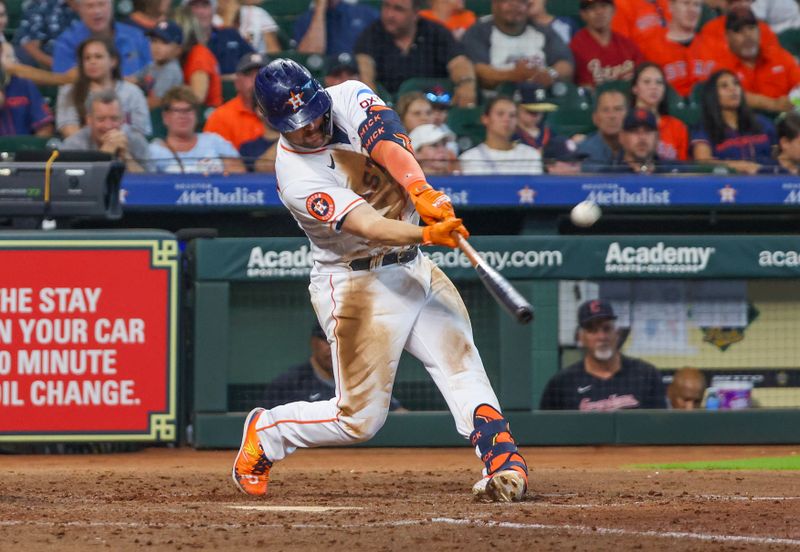 Aug 2, 2023; Houston, Texas, USA; Houston Astros center fielder Chas McCormick (20) hits a home run against the Cleveland Guardians in the sixth inning at Minute Maid Park. Mandatory Credit: Thomas Shea-USA TODAY Sports