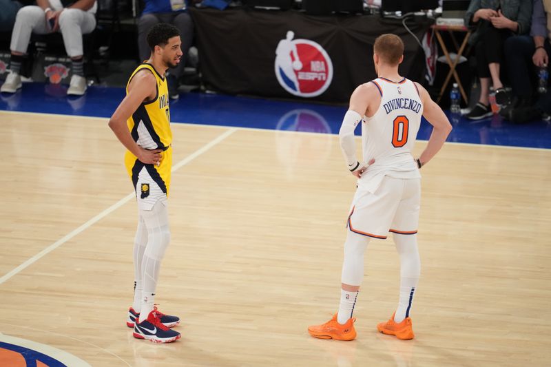 NEW YORK, NY - MAY 19: Tyrese Haliburton #0 of the Indiana Pacers and Donte Divincenzo #0 of the New York Knicks look on during the game Pacers during Round 2 Game 7 of the 2024 NBA Playoffs on May 19, 2024 at Madison Square Garden in New York City, New York.  NOTE TO USER: User expressly acknowledges and agrees that, by downloading and or using this photograph, User is consenting to the terms and conditions of the Getty Images License Agreement. Mandatory Copyright Notice: Copyright 2024 NBAE  (Photo by Jesse D. Garrabrant/NBAE via Getty Images)