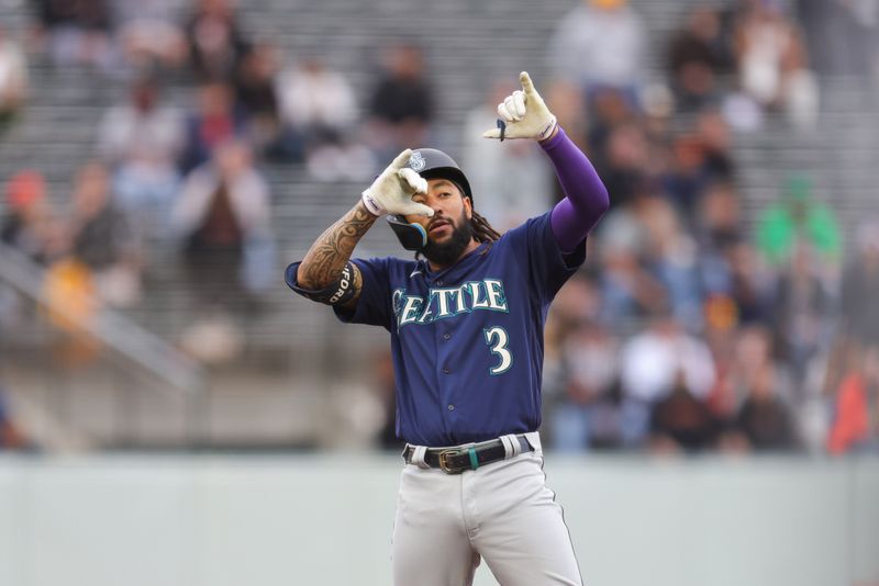 Jul 5, 2023; San Francisco, California, USA; Seattle Mariners shortstop J.P. Crawford (3) celebrates after hitting a double during the third inning against the San Francisco Giants at Oracle Park. Mandatory Credit: Sergio Estrada-USA TODAY Sports