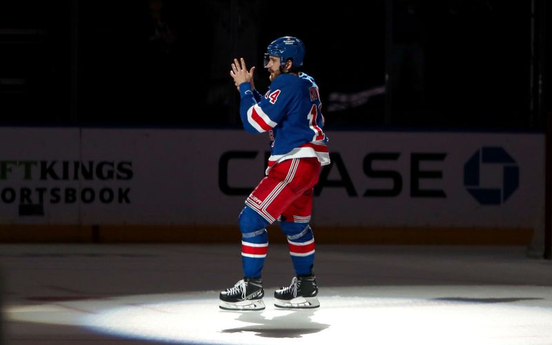 Apr 5, 2023; New York, New York, USA; New York Rangers center Tyler Motte (14) is honored as the first start of the game after scoring two goals against the Tampa Bay Lightning at Madison Square Garden. Mandatory Credit: Danny Wild-USA TODAY Sports