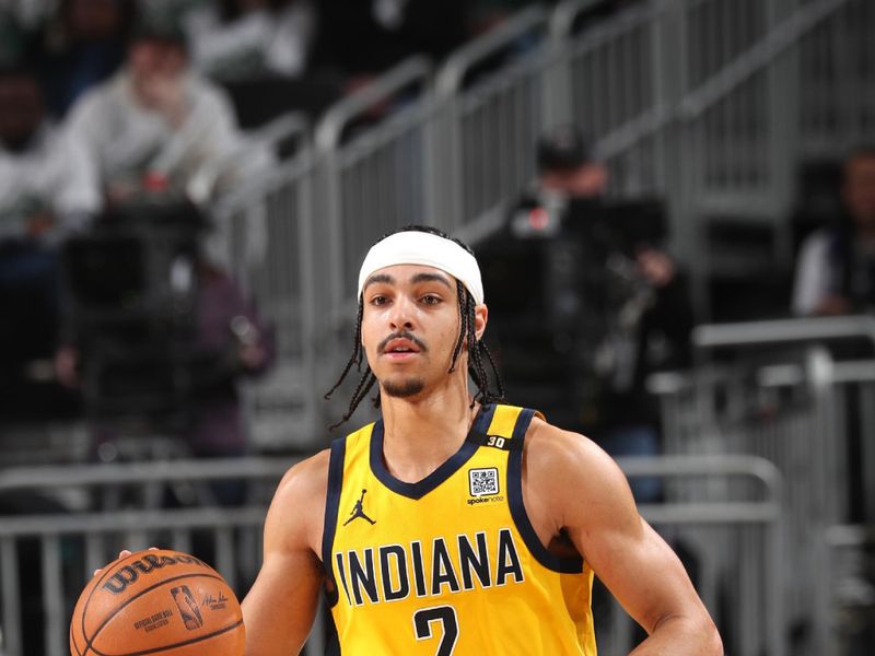 MILWAUKEE, WI - APRIL 23: Andrew Nembhard #2 of the Indiana Pacers dribbles the ball during the game against the Milwaukee Bucks during Round One Game Two of the 2024 NBA Playoffs on April 23, 2024 at the Fiserv Forum Center in Milwaukee, Wisconsin. NOTE TO USER: User expressly acknowledges and agrees that, by downloading and or using this Photograph, user is consenting to the terms and conditions of the Getty Images License Agreement. Mandatory Copyright Notice: Copyright 2024 NBAE (Photo by Gary Dineen/NBAE via Getty Images).