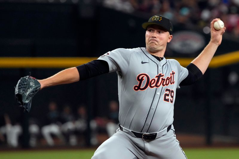 May 17, 2024; Phoenix, Arizona, USA; Detroit Tigers pitcher Tarik Skubal (29) throws against the Arizona Diamondbacks in the first inning at Chase Field. Mandatory Credit: Rick Scuteri-USA TODAY Sports