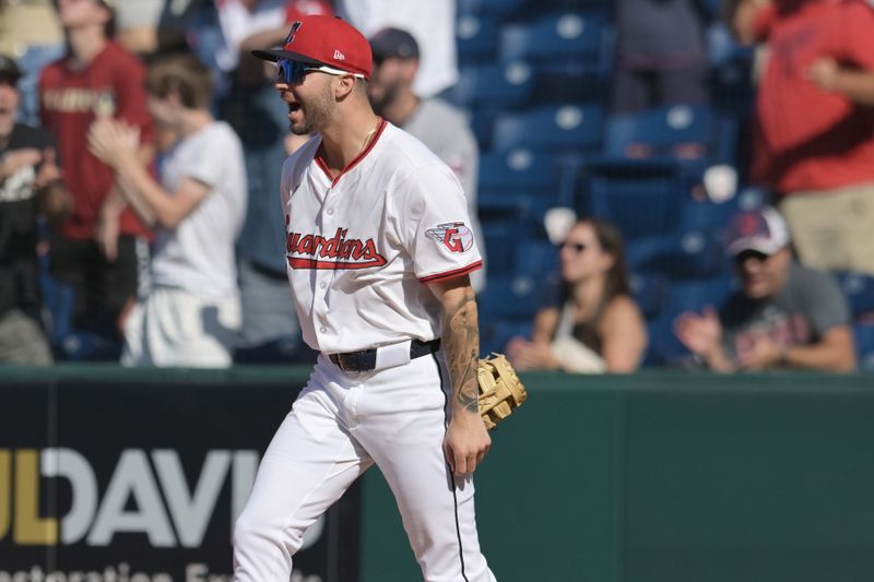 Sep 14, 2025; Cleveland, Ohio, USA; Cleveland Guardians first baseman C.J. Kayfus (63) celebrates after the Guardians beat the Chicago White Sox  at Progressive Field. Mandatory Credit: Ken Blaze-Imagn Images