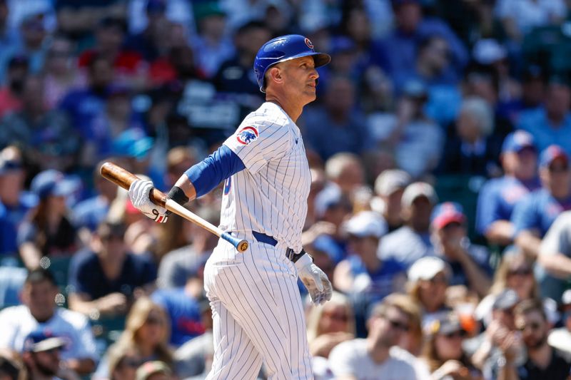 May 8, 2024; Chicago, Illinois, USA; Chicago Cubs catcher Yan Gomes (15) reacts after striking out against the San Diego Padres during the fifth inning at Wrigley Field. Mandatory Credit: Kamil Krzaczynski-USA TODAY Sports