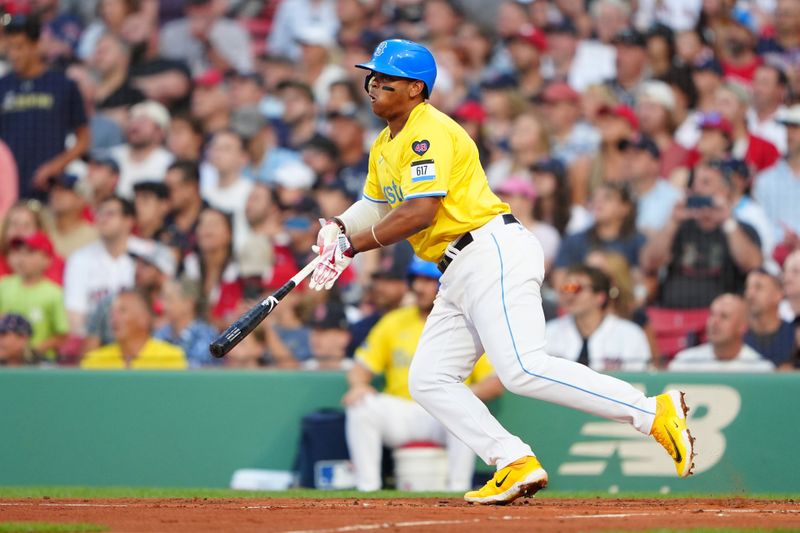 Jul 27, 2024; Boston, Massachusetts, USA; Boston Red Sox third baseman Rafael Devers (11) runs out a single against the New York Yankees during the first inning at Fenway Park. Mandatory Credit: Gregory Fisher-USA TODAY Sports