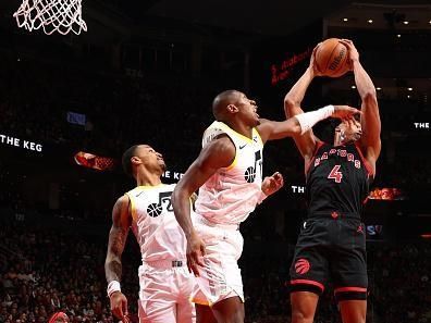 TORONTO, CANADA - DECEMBER 23:  Scottie Barnes #4 of the Toronto Raptors grabs a rebound during the game against the Utah Jazz on December 23, 2023 at the Scotiabank Arena in Toronto, Ontario, Canada.  NOTE TO USER: User expressly acknowledges and agrees that, by downloading and or using this Photograph, user is consenting to the terms and conditions of the Getty Images License Agreement.  Mandatory Copyright Notice: Copyright 2023 NBAE (Photo by Vaughn Ridley/NBAE via Getty Images)