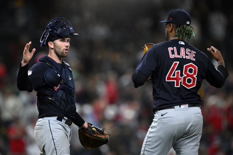 Jun 15, 2023; San Diego, California, USA; Cleveland Guardians catcher David Fry (12) and relief pitcher Emmanuel Clase (48) celebrate after defeating the San Diego Padres at Petco Park. Mandatory Credit: Orlando Ramirez-USA TODAY Sports