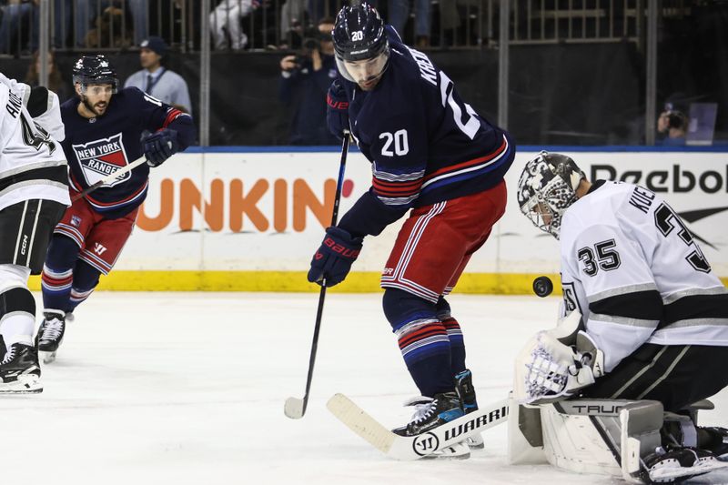 Dec 14, 2024; New York, New York, USA;  Los Angeles Kings goaltender Darcy Kuemper (35) makes a save on a shot on goal attempt by New York Rangers left wing Chris Kreider (20) in the second period at Madison Square Garden. Mandatory Credit: Wendell Cruz-Imagn Images