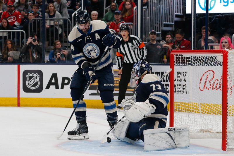 Apr 16, 2024; Columbus, Ohio, USA; Columbus Blue Jackets goalie Jet Greaves (73) makes a save against the Carolina Hurricanes during the first period at Nationwide Arena. Mandatory Credit: Russell LaBounty-USA TODAY Sports