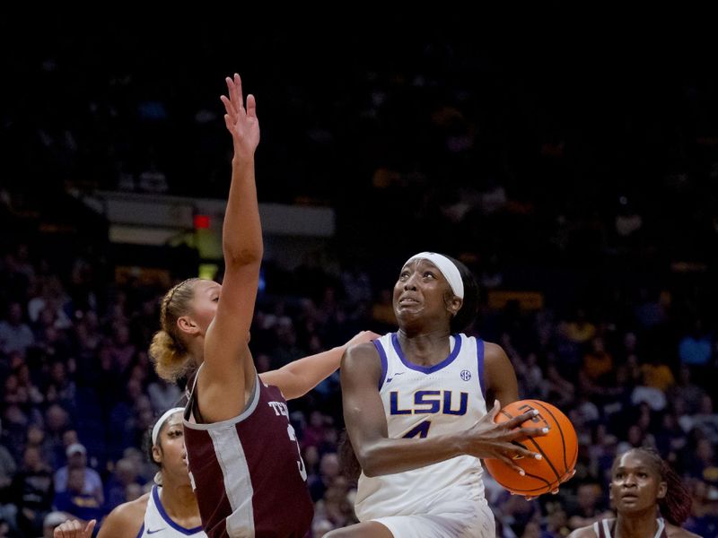 Jan 11, 2024; Baton Rouge, Louisiana, USA; LSU Lady Tigers guard Flau'jae Johnson (4) shoots against Texas A&M Aggies forward Lauren Ware (32) during the second half at Pete Maravich Assembly Center. Mandatory Credit: Matthew Hinton-USA TODAY Sports