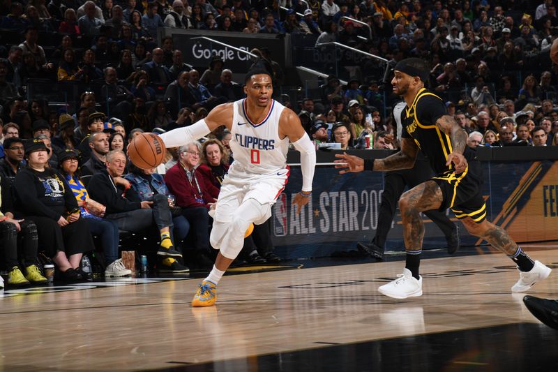 SAN FRANCISCO, CA - FEBRUARY 14: Russell Westbrook #0 of the LA Clippers dribbles the ball during the game against the Golden State Warriors on FEBRUARY 14, 2024 at Chase Center in San Francisco, California. NOTE TO USER: User expressly acknowledges and agrees that, by downloading and or using this photograph, user is consenting to the terms and conditions of Getty Images License Agreement. Mandatory Copyright Notice: Copyright 2024 NBAE (Photo by Noah Graham/NBAE via Getty Images)