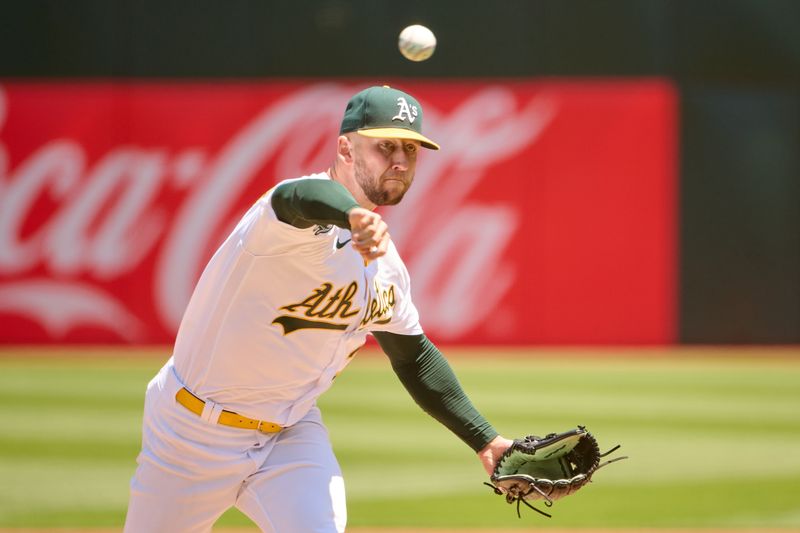 Jun 17, 2023; Oakland, California, USA; Oakland Athletics pitcher James Kaprielian (32) throws a pitch against the Philadelphia Phillies during the first inning at Oakland-Alameda County Coliseum. Mandatory Credit: Robert Edwards-USA TODAY Sports