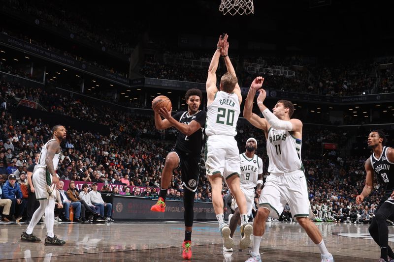 BROOKLYN, NY - DECEMBER 8: Cameron Johnson #2 of the Brooklyn Nets looks to pass the ball during the game against the Milwaukee Bucks on December 8, 2024 at Barclays Center in Brooklyn, New York. NOTE TO USER: User expressly acknowledges and agrees that, by downloading and or using this Photograph, user is consenting to the terms and conditions of the Getty Images License Agreement. Mandatory Copyright Notice: Copyright 2024 NBAE (Photo by Nathaniel S. Butler/NBAE via Getty Images)
