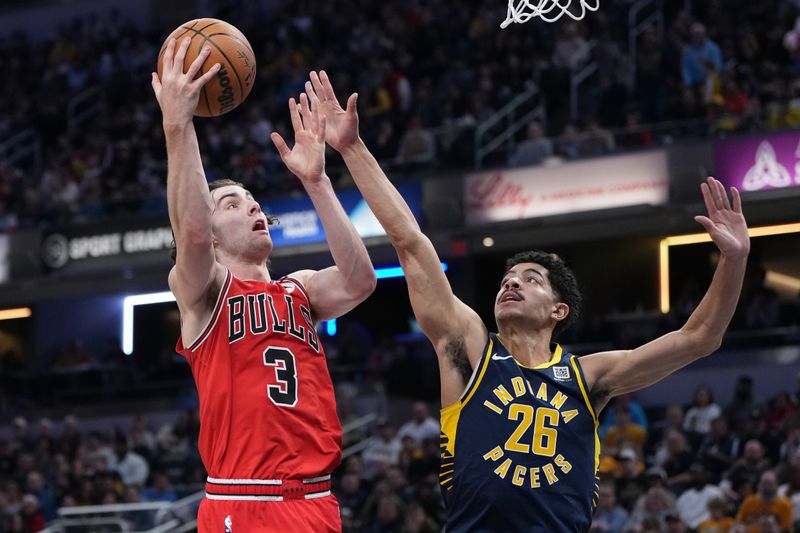 INDIANAPOLIS, INDIANA - MARCH 02: Josh Giddey #3 of the Chicago Bulls attempts a shot while being guarded by Ben Sheppard #26 of the Indiana Pacers in the fourth quarter at Gainbridge Fieldhouse on March 02, 2025 in Indianapolis, Indiana. NOTE TO USER: User expressly acknowledges and agrees that, by downloading and or using this photograph, User is consenting to the terms and conditions of the Getty Images License Agreement. (Photo by Dylan Buell/Getty Images)