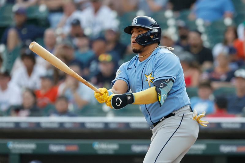 Aug 4, 2023; Detroit, Michigan, USA;  Tampa Bay Rays third baseman Isaac Paredes (17) hits an two RBI double in the first inning against the Detroit Tigers at Comerica Park. Mandatory Credit: Rick Osentoski-USA TODAY Sports