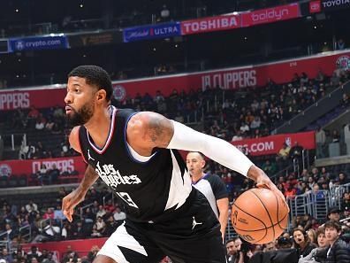 LOS ANGELES, CA - DECEMBER 6: Paul George #13 of the LA Clippers goes to the basket during the game on December 6, 2023 at Crypto.Com Arena in Los Angeles, California. NOTE TO USER: User expressly acknowledges and agrees that, by downloading and/or using this Photograph, user is consenting to the terms and conditions of the Getty Images License Agreement. Mandatory Copyright Notice: Copyright 2023 NBAE (Photo by Adam Pantozzi/NBAE via Getty Images)