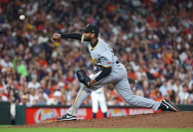 Jul 30, 2024; Houston, Texas, USA; Pittsburgh Pirates relief pitcher Dennis Santana (60) delivers a pitch during the sixth inning against the Houston Astros at Minute Maid Park. Mandatory Credit: Troy Taormina-USA TODAY Sports