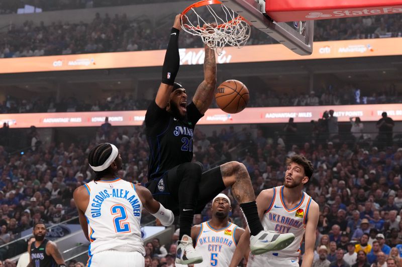 DALLAS, TEXAS - MAY 18: Daniel Gafford #21 of the Dallas Mavericks dunks the ball against the Oklahoma City Thunder during the first quarter in Game Six of the Western Conference Second Round Playoffs at American Airlines Center on May 18, 2024 in Dallas, Texas. NOTE TO USER: User expressly acknowledges and agrees that, by downloading and or using this photograph, User is consenting to the terms and conditions of the Getty Images License Agreement. (Photo by Sam Hodde/Getty Images)