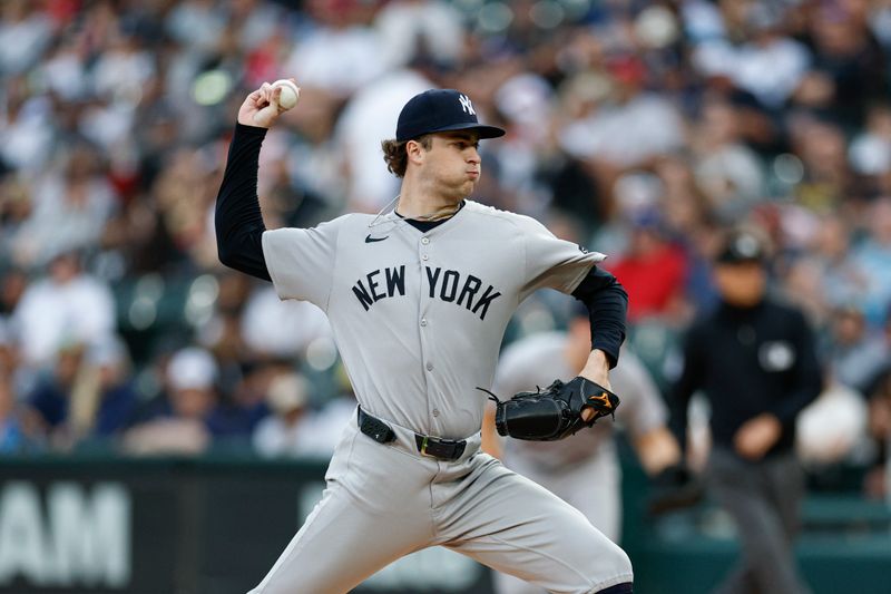 Aug 30, 2025; Chicago, Illinois, USA; New York Yankees starting pitcher Cam Schlittler (31) delivers a pitch against the Chicago White Sox during the first inning at Rate Field. Mandatory Credit: Kamil Krzaczynski-Imagn Images