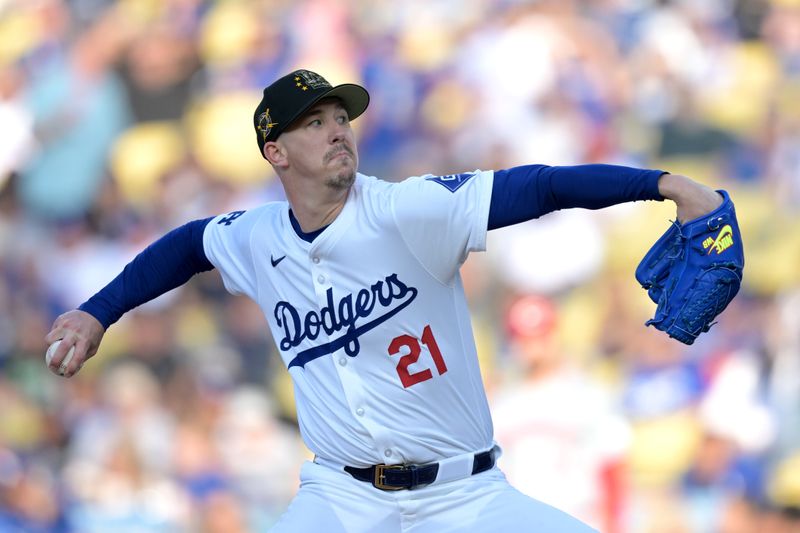 May 18, 2024; Los Angeles, California, USA;  Los Angeles Dodgers starting pitcher Walker Buehler (21) delivers to the plate in the first inning against the Cincinnati Reds at Dodger Stadium. Mandatory Credit: Jayne Kamin-Oncea-USA TODAY Sports