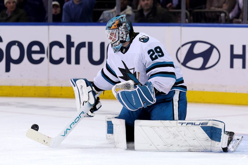 Nov 14, 2024; New York, New York, USA; San Jose Sharks goaltender Mackenzie Blackwood (29) makes a save against the New York Rangers during the third period at Madison Square Garden. Mandatory Credit: Brad Penner-Imagn Images