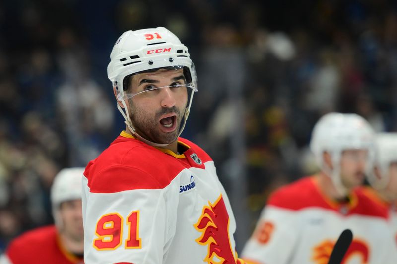 Nov 23, 2025; Vancouver, British Columbia, CAN;  Calgary Flames center Nazem Kadri (91) awaits the faceoff during the first period against the Vancouver Canucks at Rogers Arena. Mandatory Credit: Simon Fearn-Imagn Images