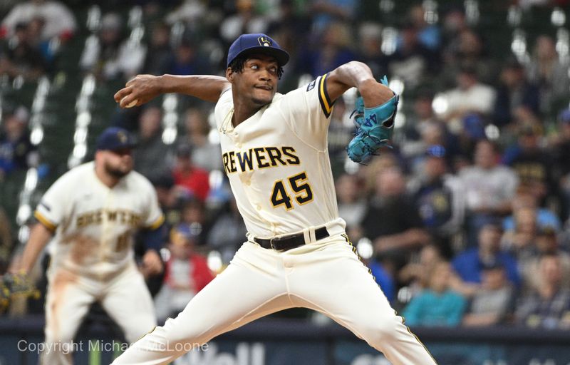 Sep 27, 2023; Milwaukee, Wisconsin, USA; Milwaukee Brewers relief pitcher Abner Uribe (45) delivers a pitch against the St. Louis Cardinals in the sixth inning at American Family Field. Mandatory Credit: Michael McLoone-USA TODAY Sports