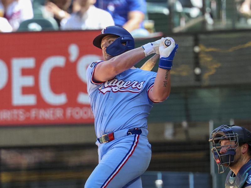 May 4, 2025; Arlington, Texas, USA;  Texas Rangers first baseman Blaine Crim (13) bats during the third inning against the Seattle Mariners at Globe Life Field. Mandatory Credit: Kevin Jairaj-Imagn Images