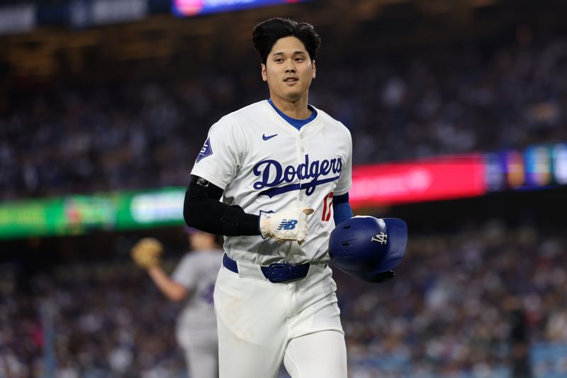 Jun 1, 2024; Los Angeles, California, USA;  Los Angeles Dodgers designated hitter Shohei Ohtani (17) runs back to the dugout after getting an out on a pick off play during the third inning at Dodger Stadium. Mandatory Credit: Kiyoshi Mio-USA TODAY Sports