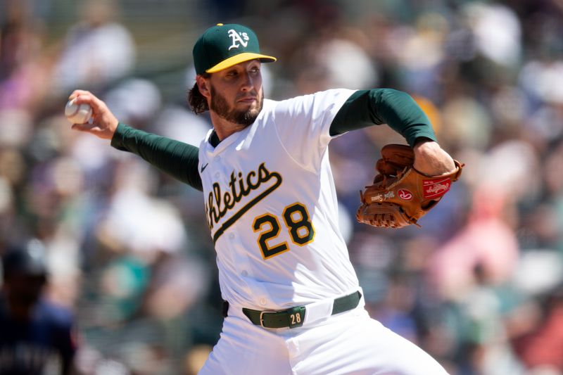 May 7, 2025; West Sacramento, California, USA; Athletics pitcher Mitch Spence (28) delivers a pitch against the Seattle Mariners during the sixth inning at Sutter Health Park. Mandatory Credit: D. Ross Cameron-Imagn Images