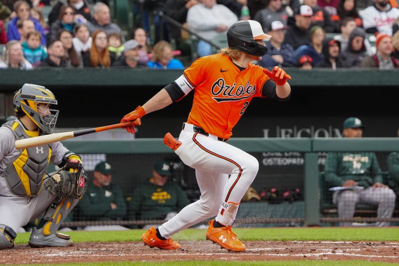 Apr 27, 2024; Baltimore, Maryland, USA; Baltimore Orioles shortstop Gunnar Henderson (2) hits a single against the Oakland Athletics during the fourth inning at Oriole Park at Camden Yards. Mandatory Credit: Gregory Fisher-USA TODAY Sports