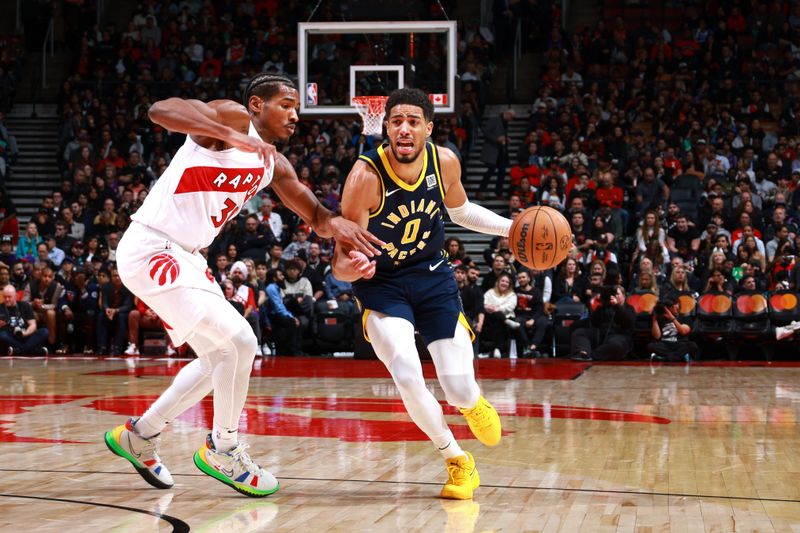 TORONTO, CANADA - NOVEMBER 18: Tyrese Haliburton #0 of the Indiana Pacers handles the ball during the game against the Toronto Raptors on November 18, 2024 at the Scotiabank Arena in Toronto, Ontario, Canada.  NOTE TO USER: User expressly acknowledges and agrees that, by downloading and or using this Photograph, user is consenting to the terms and conditions of the Getty Images License Agreement.  Mandatory Copyright Notice: Copyright 2024 NBAE (Photo by Vaughn Ridley/NBAE via Getty Images)