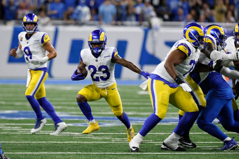 Los Angeles Rams running back Kyren Williams (23) runs the ball against the Detroit Lions during the first half of an NFL football game in Detroit, Sunday, Sept. 8, 2024. (AP Photo/Duane Burleson)