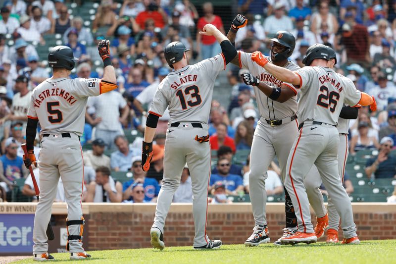 Jun 19, 2024; Chicago, Illinois, USA; San Francisco Giants designated hitter Jorge Soler (2) celebrates with teammates after hitting a grand slam against the Chicago Cubs during the eight inning at Wrigley Field. Mandatory Credit: Kamil Krzaczynski-USA TODAY Sports