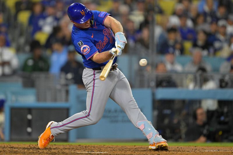 Jun 4, 2025; Los Angeles, California, USA; New York Mets first baseman Pete Alonso (20) hits a three run home run in the eighth inning against the Los Angeles Dodgers at Dodger Stadium. Mandatory Credit: Jayne Kamin-Oncea-Imagn Images