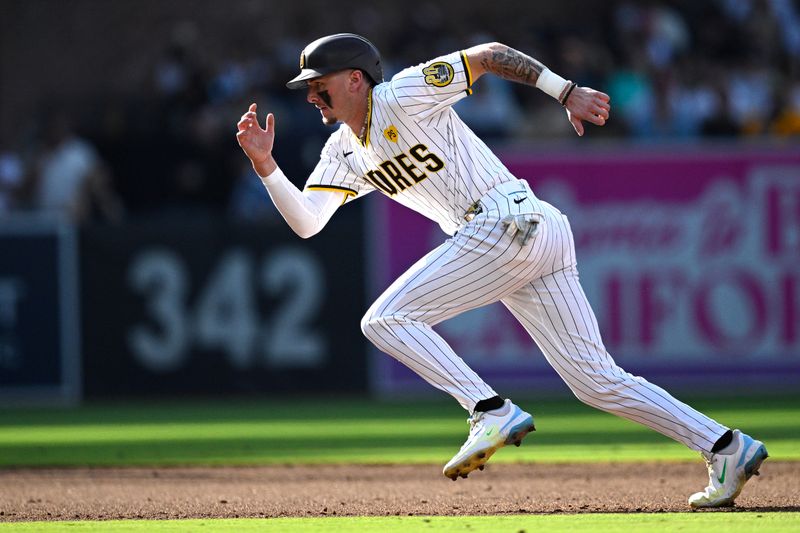 Aug 21, 2024; San Diego, California, USA; San Diego Padres center fielder Jackson Merrill (3) leads off second base during the fourth inning against the Minnesota Twins at Petco Park. Mandatory Credit: Orlando Ramirez-USA TODAY Sports